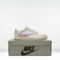 Kicks and The Drip Nike Air Jordan low-top sneakers in white and off-white leather with a vibrant pink reverse Swoosh.